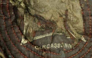 Detail of cap, 1908.14.0010.